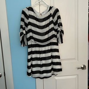 Two for one - open to see both Never been worn boutique dresses - size L